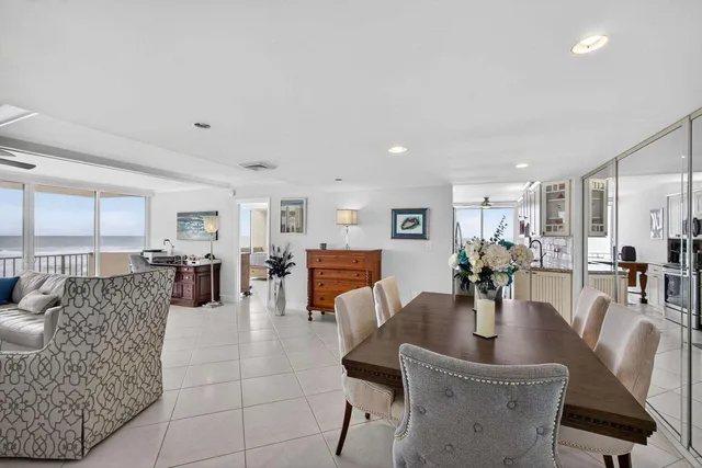 a kitchen with granite countertop a sink a stove and cabinets