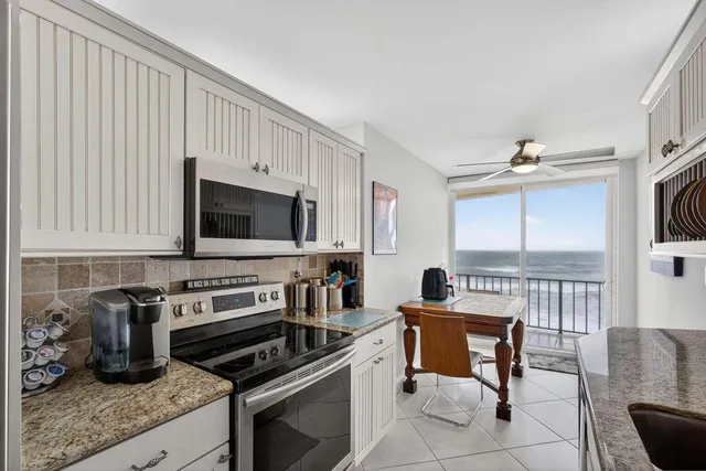 a view of a dining room kitchen and a window