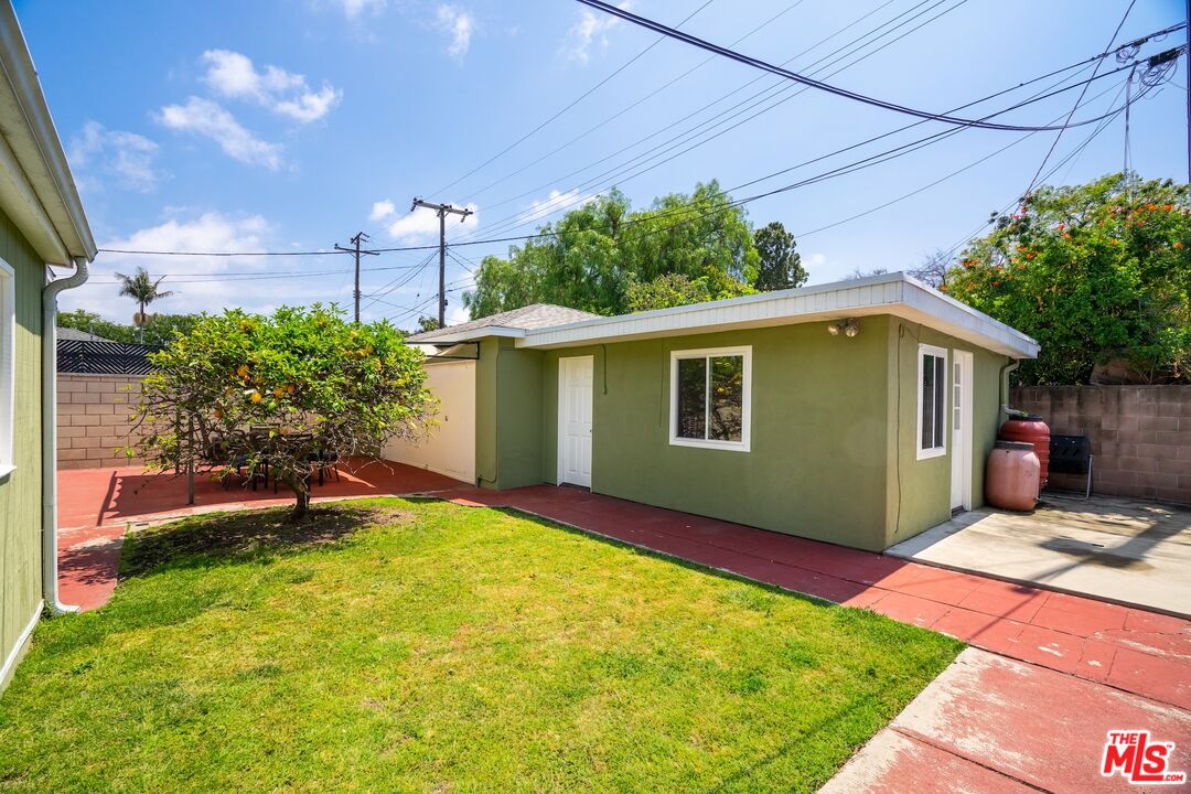 4367 Globe Avenue Culver City, CA 90230 - Photo 26 of 34 a front view of a house with a yard