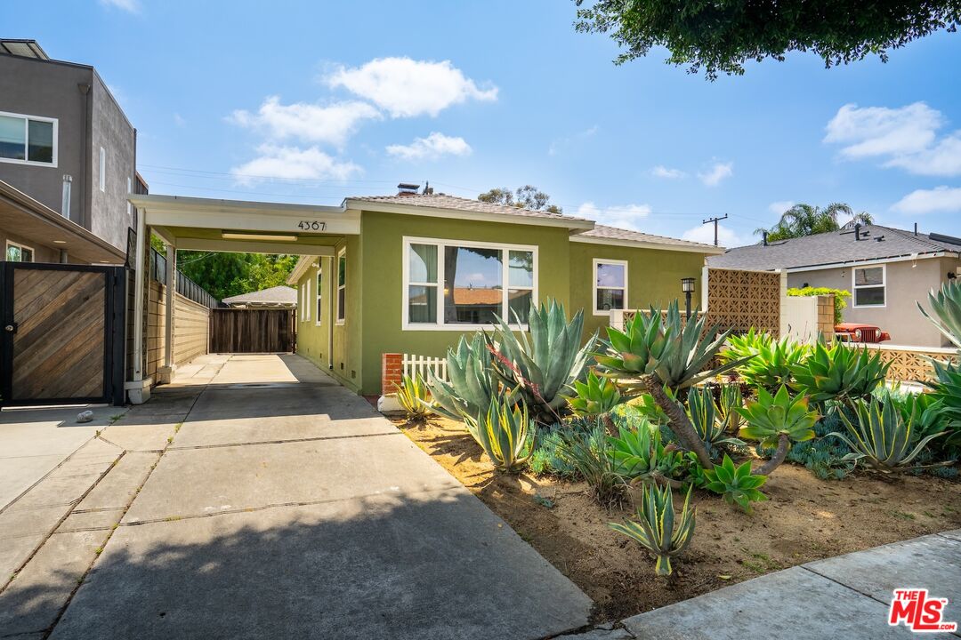 4367 Globe Avenue Culver City, CA 90230 - Photo 34 of 34 a front view of a house with a yard