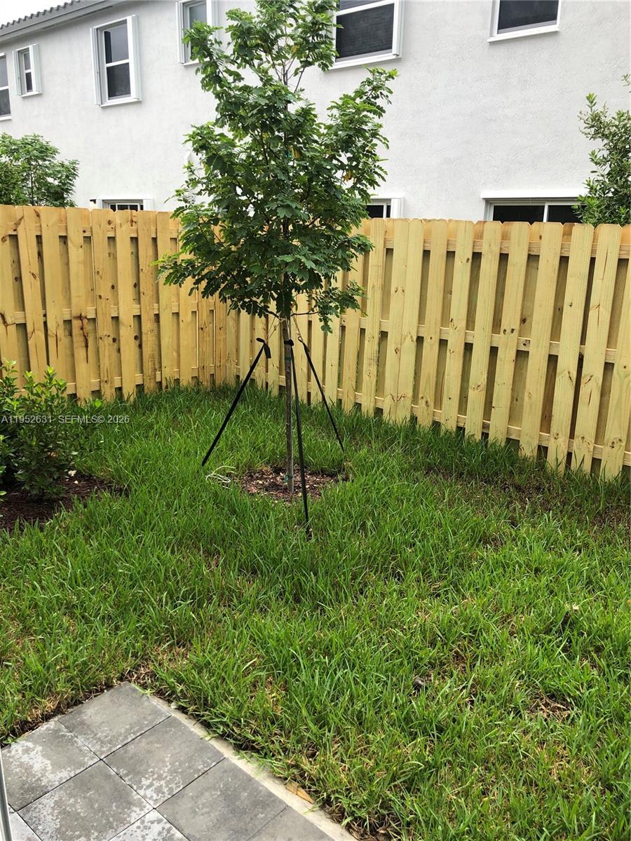 2610 Southeast 13th Street Homestead, FL 33035 - Photo 5 of 24 a view of a backyard with plants