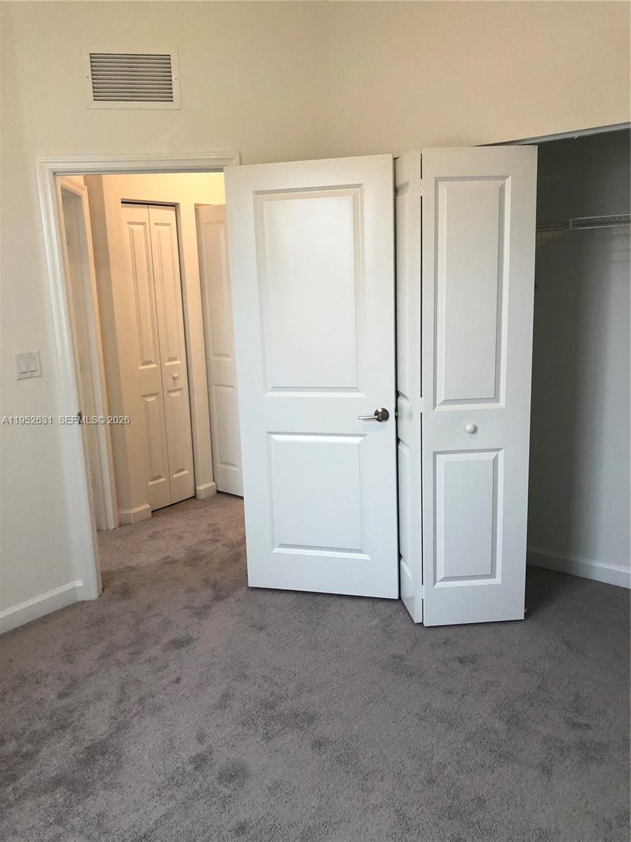 2610 Southeast 13th Street Homestead, FL 33035 - Photo 9 of 24 an empty room with windows