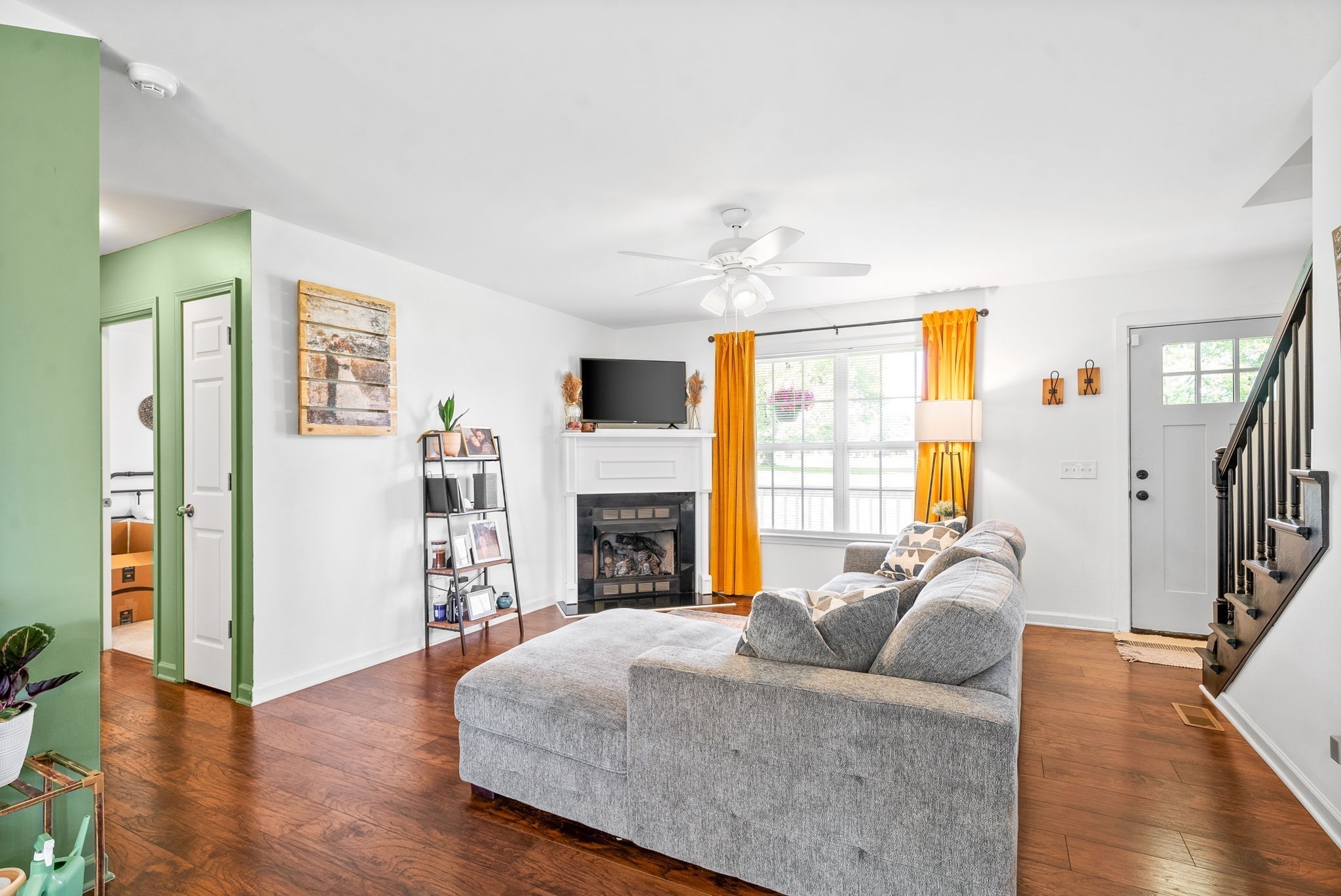6417 Highway 25 Springfield, TN 37172 - Photo 7 of 43 a living room with furniture and a fireplace