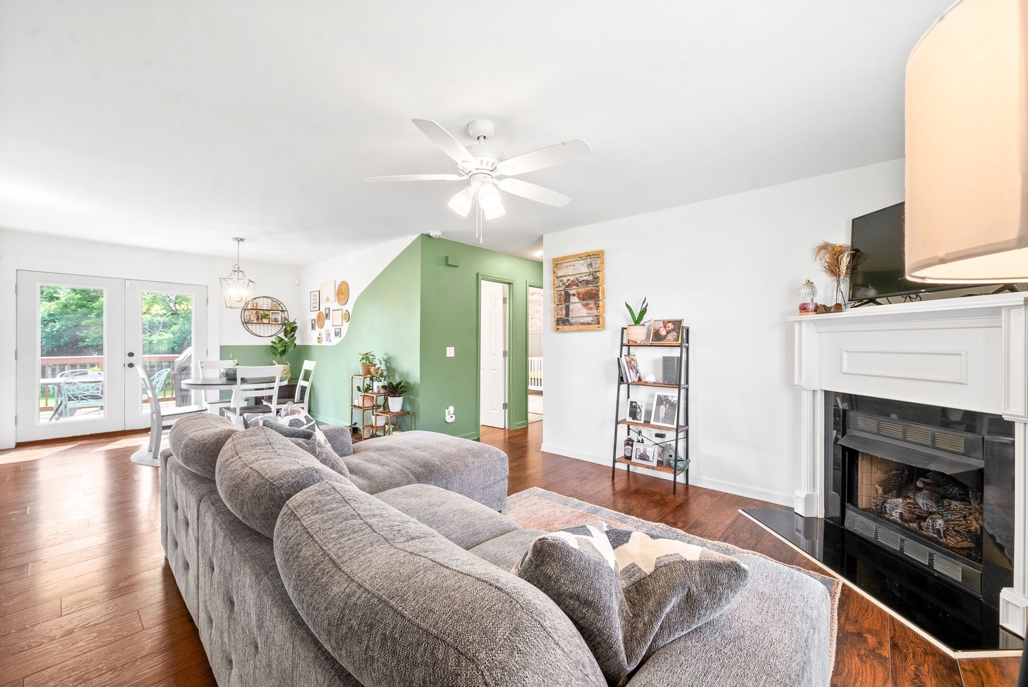 6417 Highway 25 Springfield, TN 37172 - Photo 9 of 43 a living room with furniture a fireplace and a large window