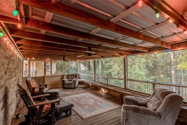 a living room with furniture with wooden floor
