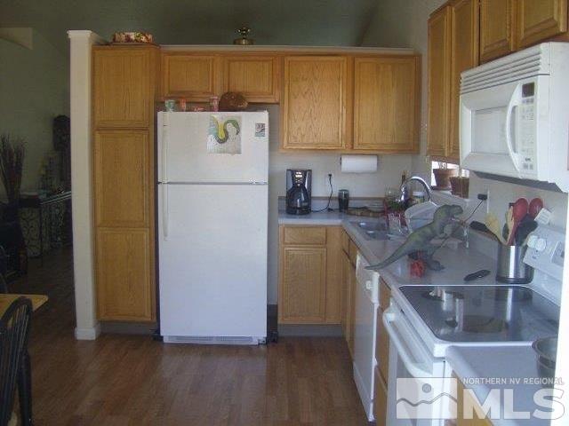 17805 Fortune Court Reno, NV 89508 - Photo 5 of 8 a white refrigerator freezer sitting in a kitchen