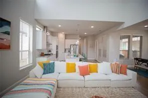 a living room with furniture and a couch