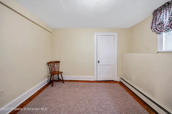 a view of room with window and closet