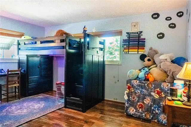 a room with toys and wooden floor