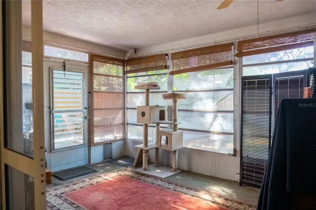 a room with window and furniture