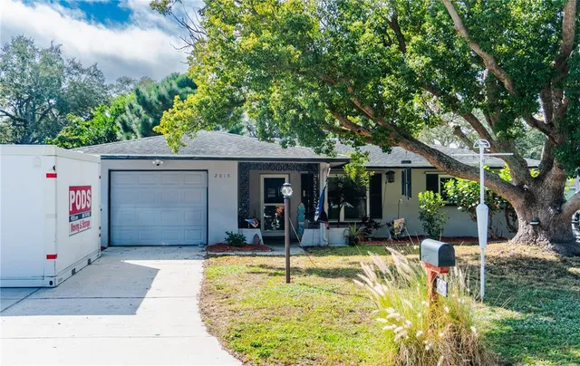 front view of a house with a patio