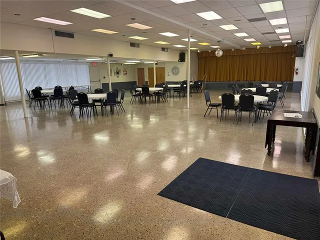a view of a lobby with gym equipment