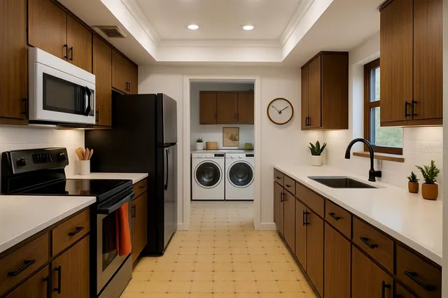 a kitchen with a sink a stove top oven and refrigerator