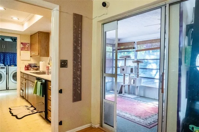 a view of a kitchen from the hallway