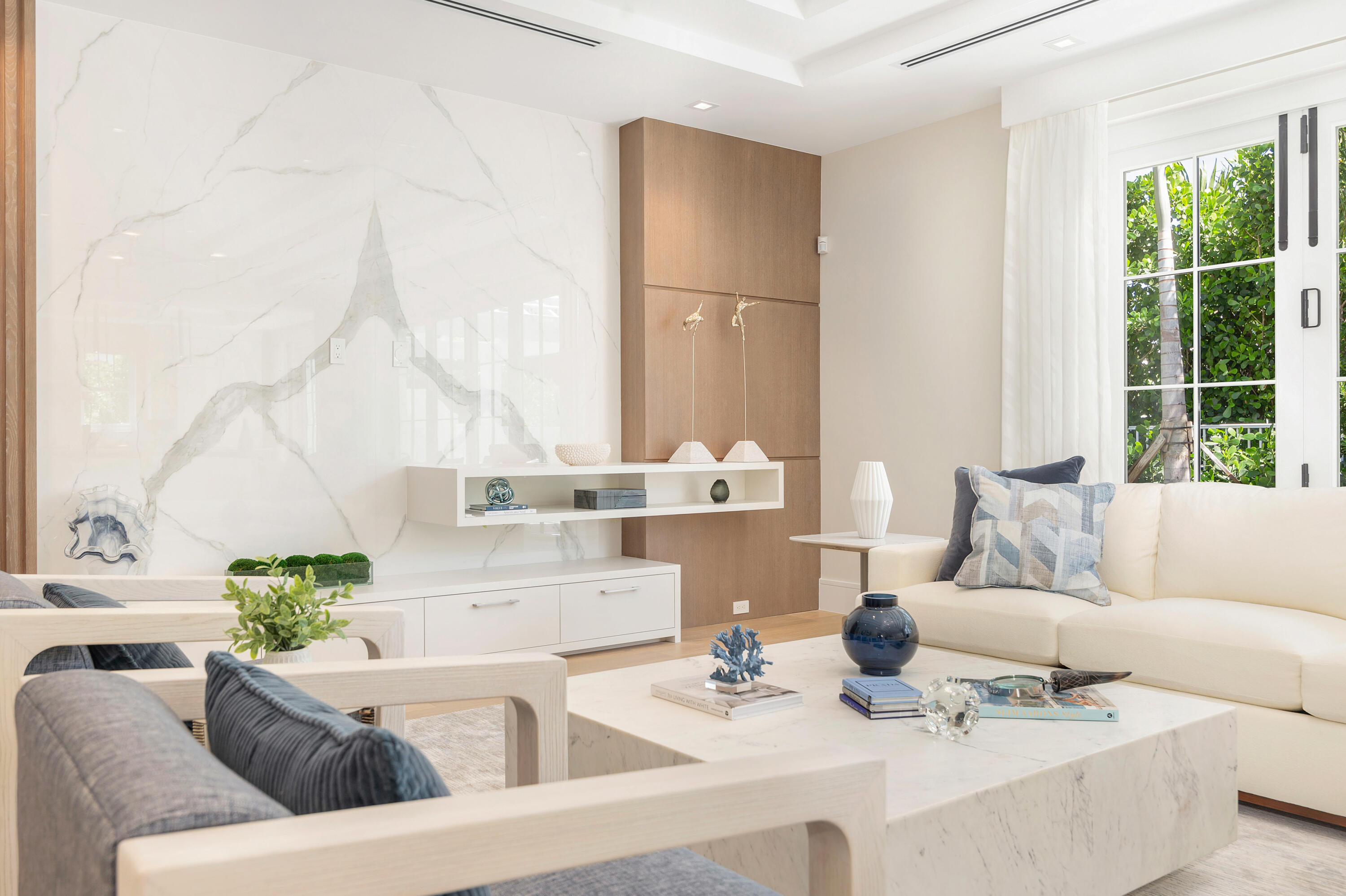 223 Monterey Road Palm Beach, FL 33480 - Photo 17 of 45 a living room with furniture and a large window