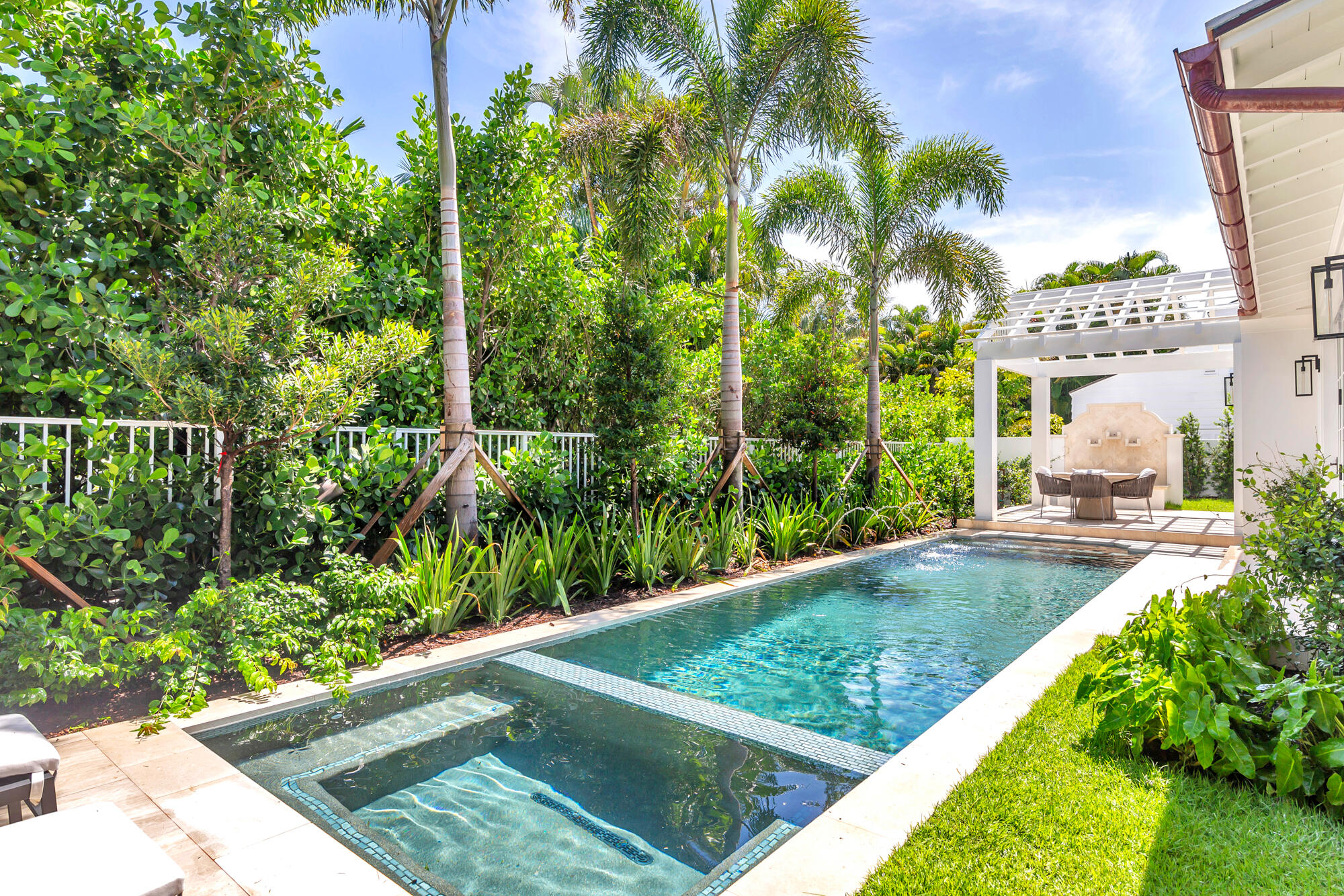 223 Monterey Road Palm Beach, FL 33480 - Photo 42 of 45 a view of a backyard with plants