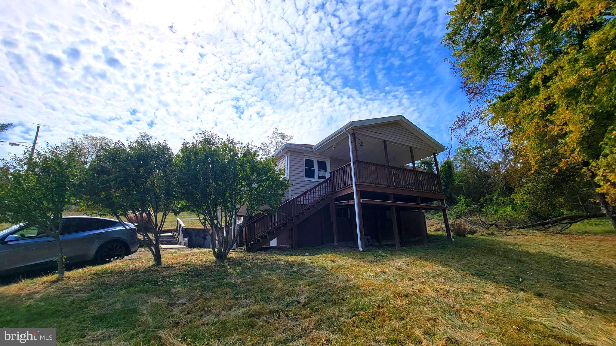 12809 Walsh Road Mount Savage, MD 21545 - Photo 11 of 30 a view of a house with a yard