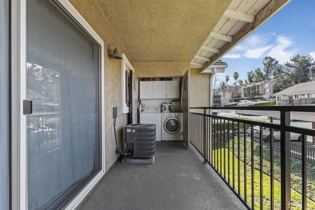 495 San Pasqual Valley Road, Unit 144 Escondido, CA 92025 - Photo 15 of 20 a view of a porch with furniture