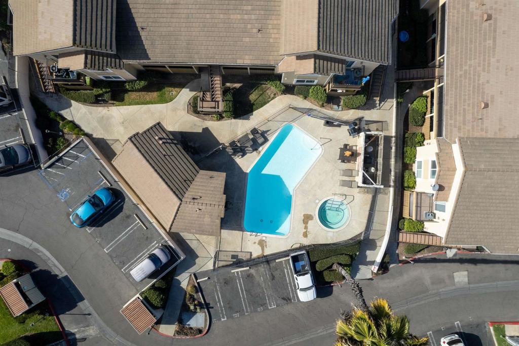 495 San Pasqual Valley Road, Unit 144 Escondido, CA 92025 - Photo 18 of 20 an aerial view of a house with outdoor space