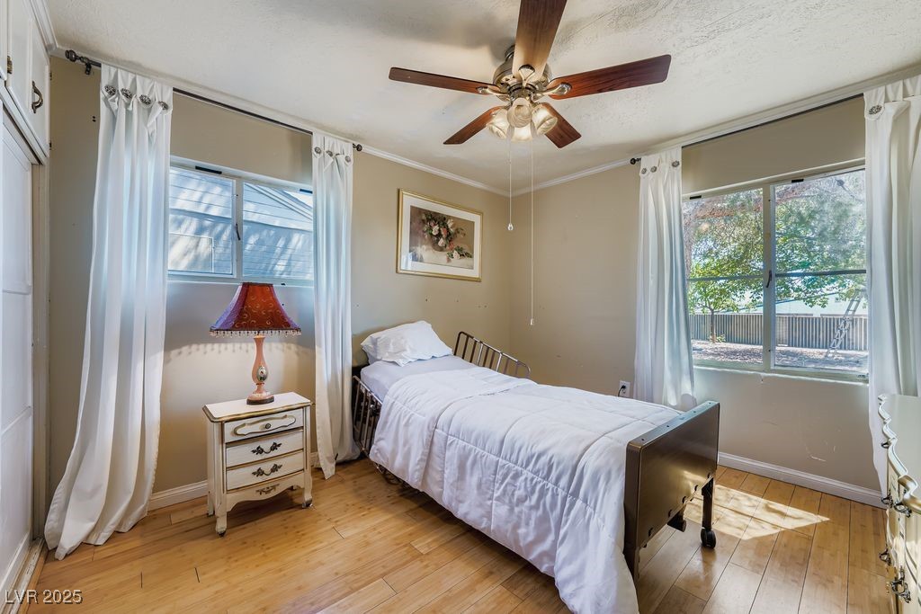 573 7th Street Boulder City, NV 89005 - Photo 12 of 25 Lots of light in primary bedroom