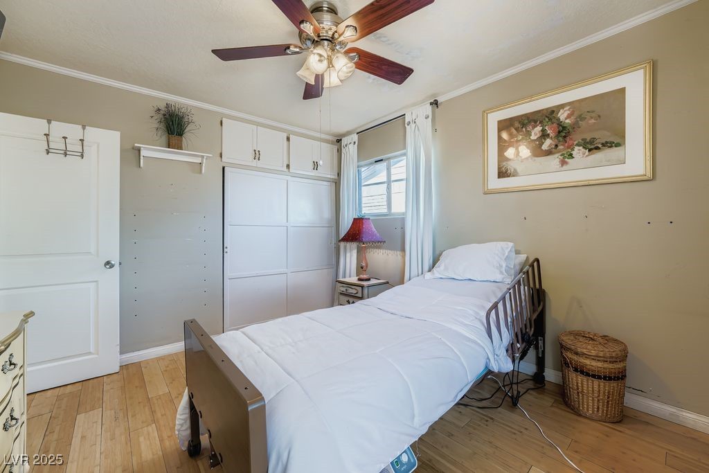 573 7th Street Boulder City, NV 89005 - Photo 13 of 25 Extra cabinet space and hardwood floors in primary bedroom