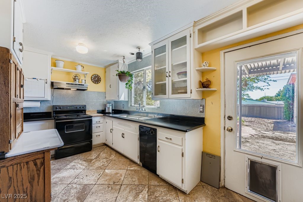 573 7th Street Boulder City, NV 89005 - Photo 9 of 25 Galley kitchen with shelves