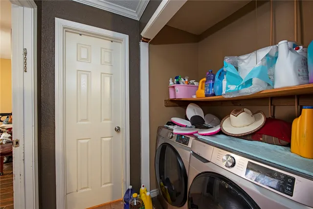 a utility room with dryer and washer