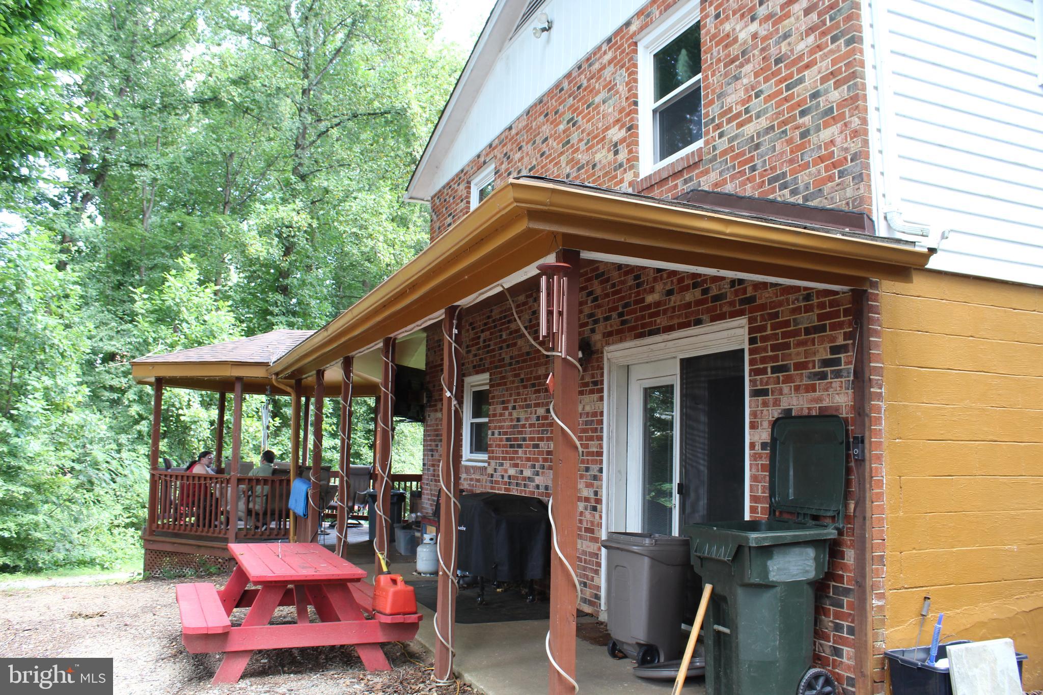 15090 Jonah Cove Place Woodbridge, VA 22193 - Photo 20 of 42 a front view of a house with balcony