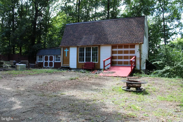 a house view with a garden space