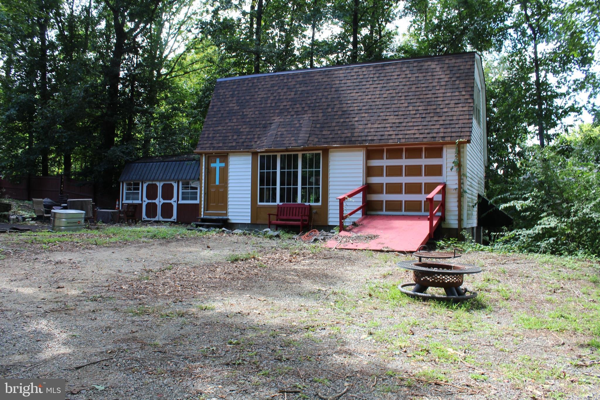 15090 Jonah Cove Place Woodbridge, VA 22193 - Photo 9 of 42 a house view with a garden space
