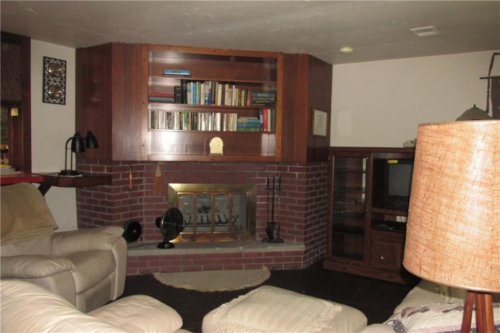 231 Mingo Church Road Finleyville, PA 15332 - Photo 5 of 20 Another view of the living room, log burning fireplace
