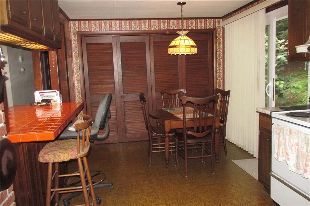 231 Mingo Church Road Finleyville, PA 15332 - Photo 8 of 20 view of the eating area, behind the folding doors is the laundry toom