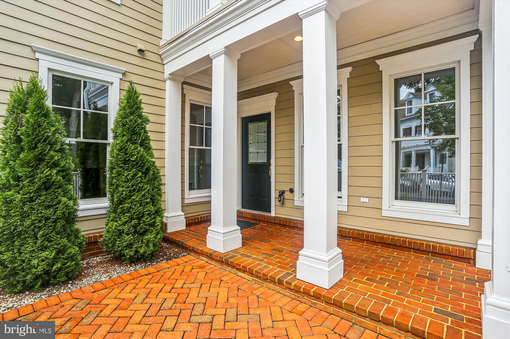 9539 Ament Street Silver Spring, MD 20910 - Photo 3 of 40 a front view of a house with a yard