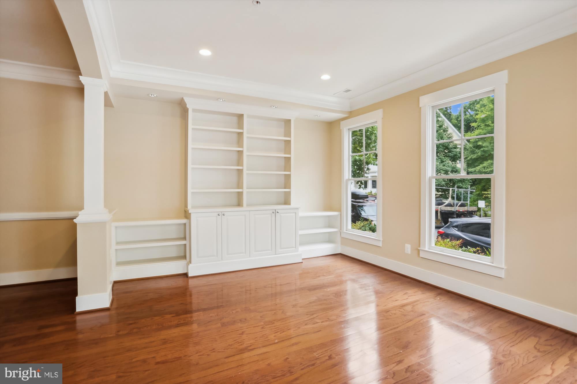 9539 Ament Street Silver Spring, MD 20910 - Photo 7 of 40 an empty room with wooden floor and windows