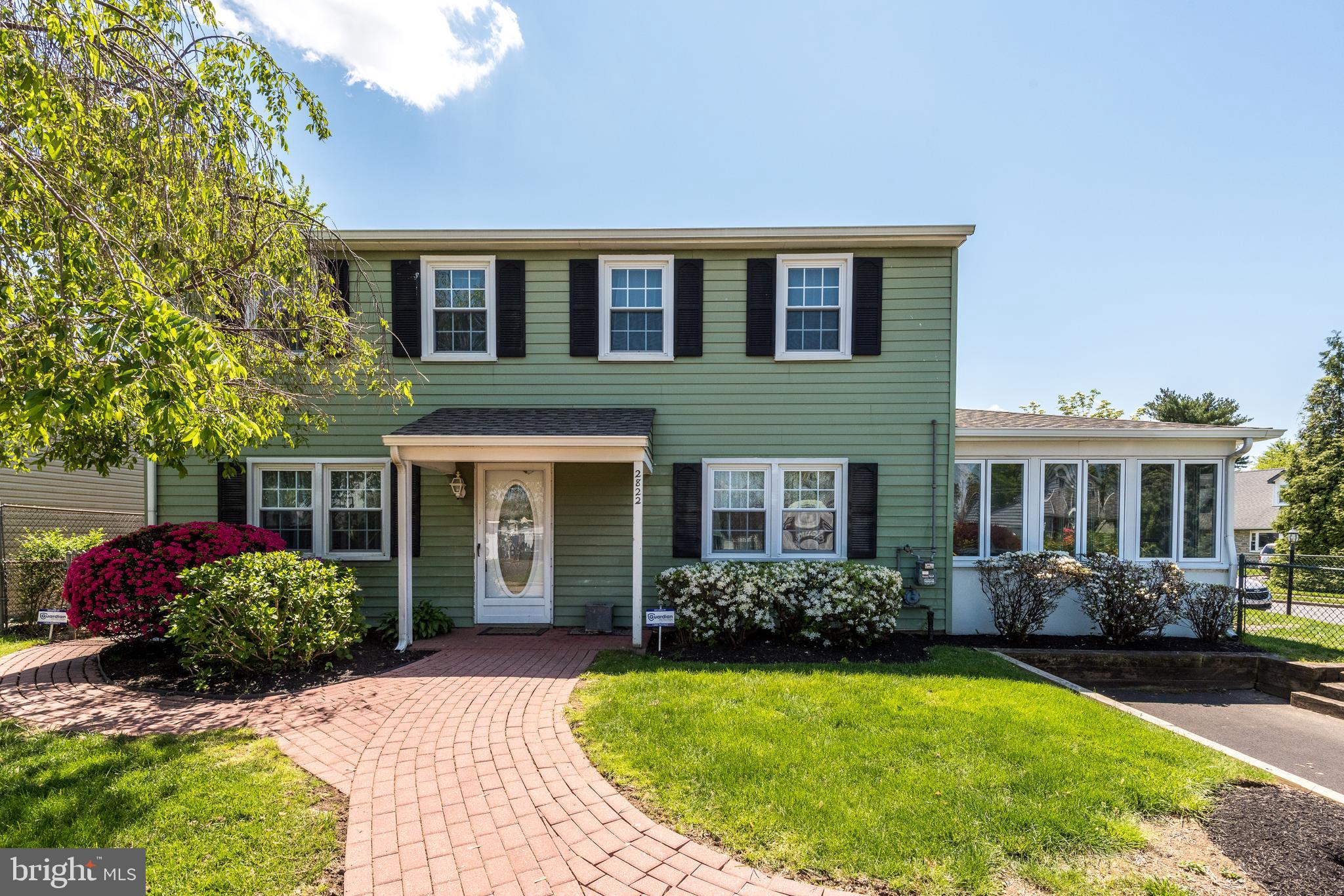 Colonial with Family Room and Sun Room Additions