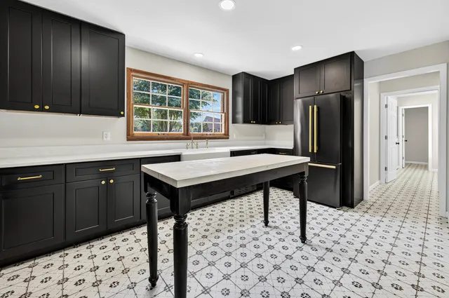 wooden floor with white walls