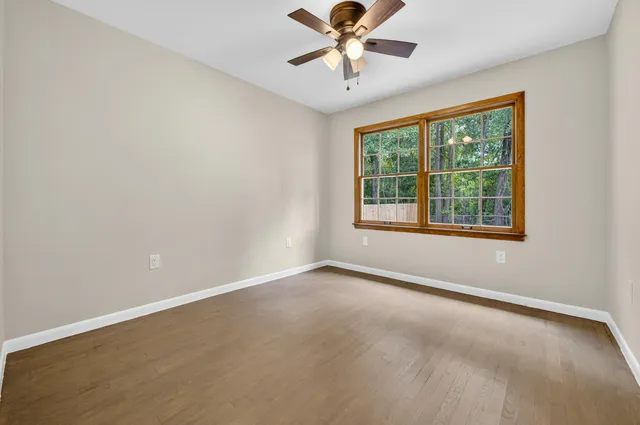 a view of a room that has a window