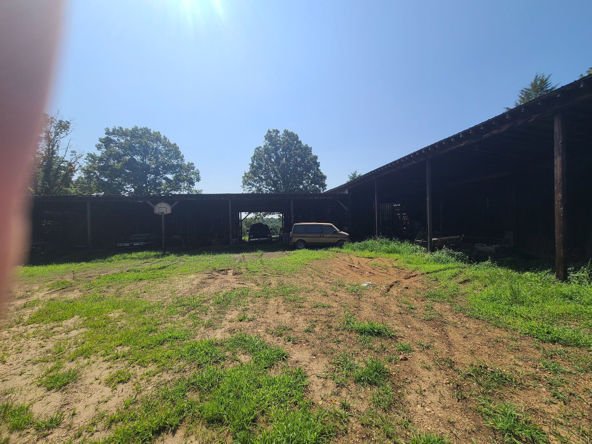 954 South Buchanan Road Waverly, TN 37185 - Photo 11 of 20 a backyard of a house