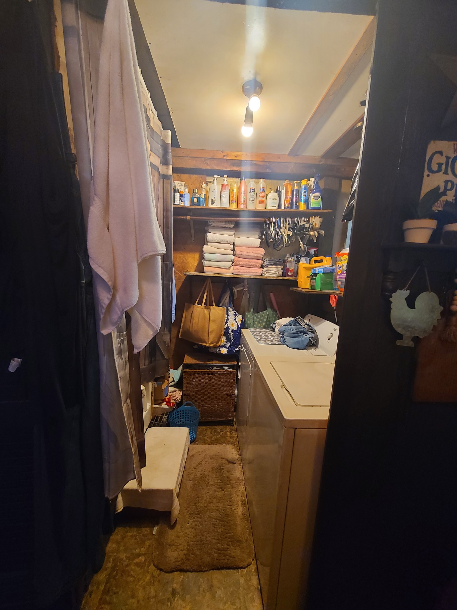 954 South Buchanan Road Waverly, TN 37185 - Photo 16 of 20 a view of a room with washer and dryer