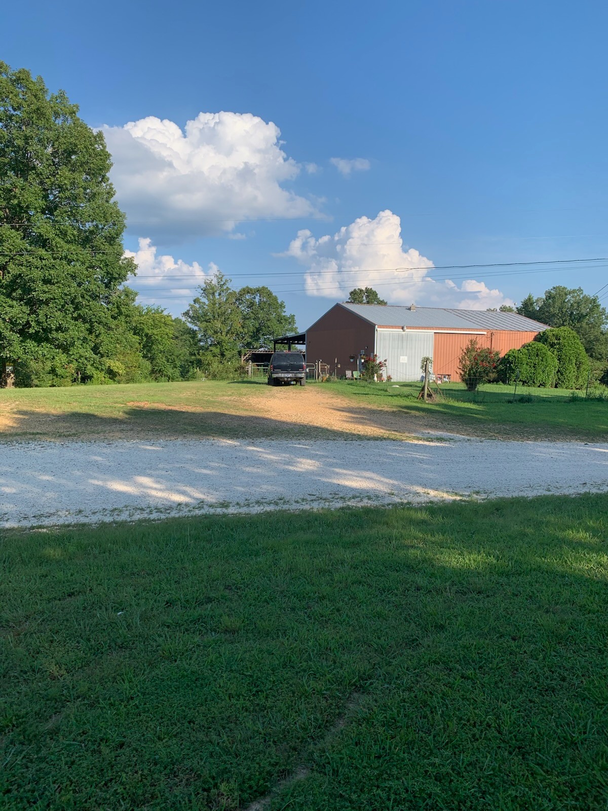 954 South Buchanan Road Waverly, TN 37185 - Photo 3 of 20 a view of a golf course with a lake