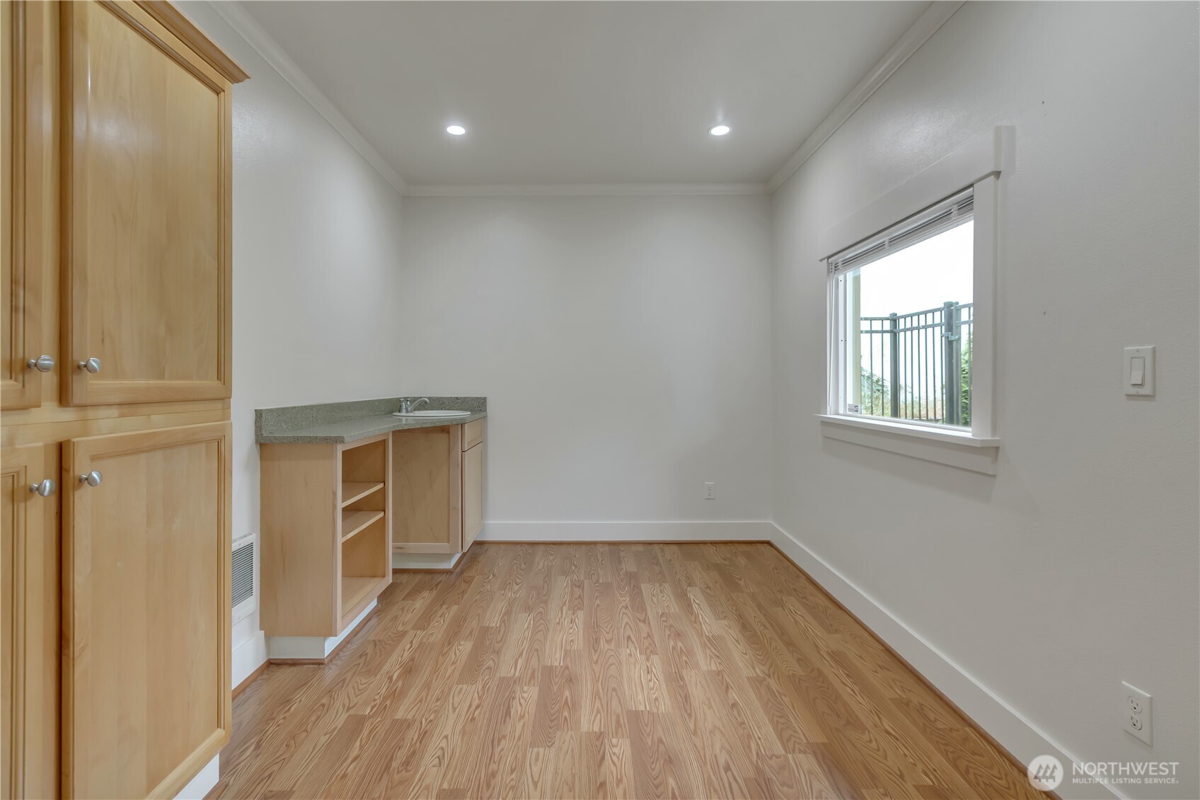 4945 North Pearl Street Ruston, WA 98407 - Photo 12 of 22 a view of empty room with wooden floor and fan