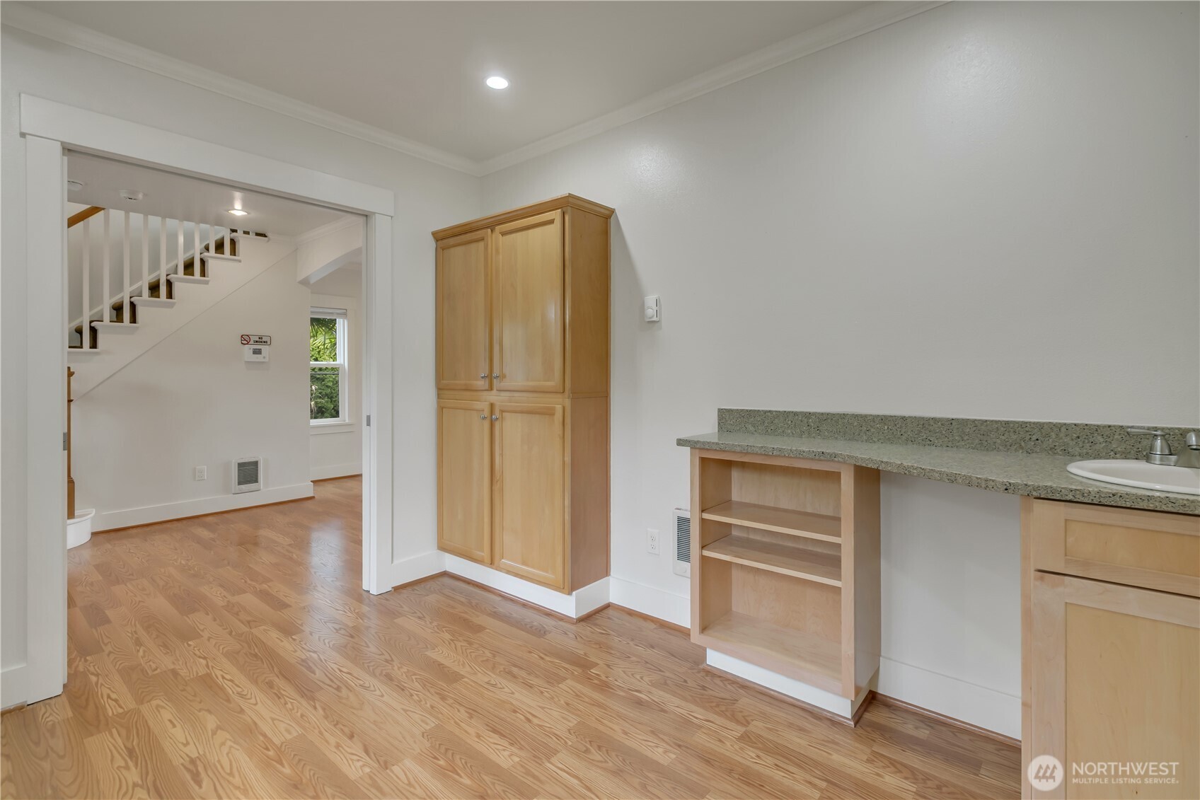 4945 North Pearl Street Ruston, WA 98407 - Photo 13 of 22 a view of an empty room with wooden floor and closet