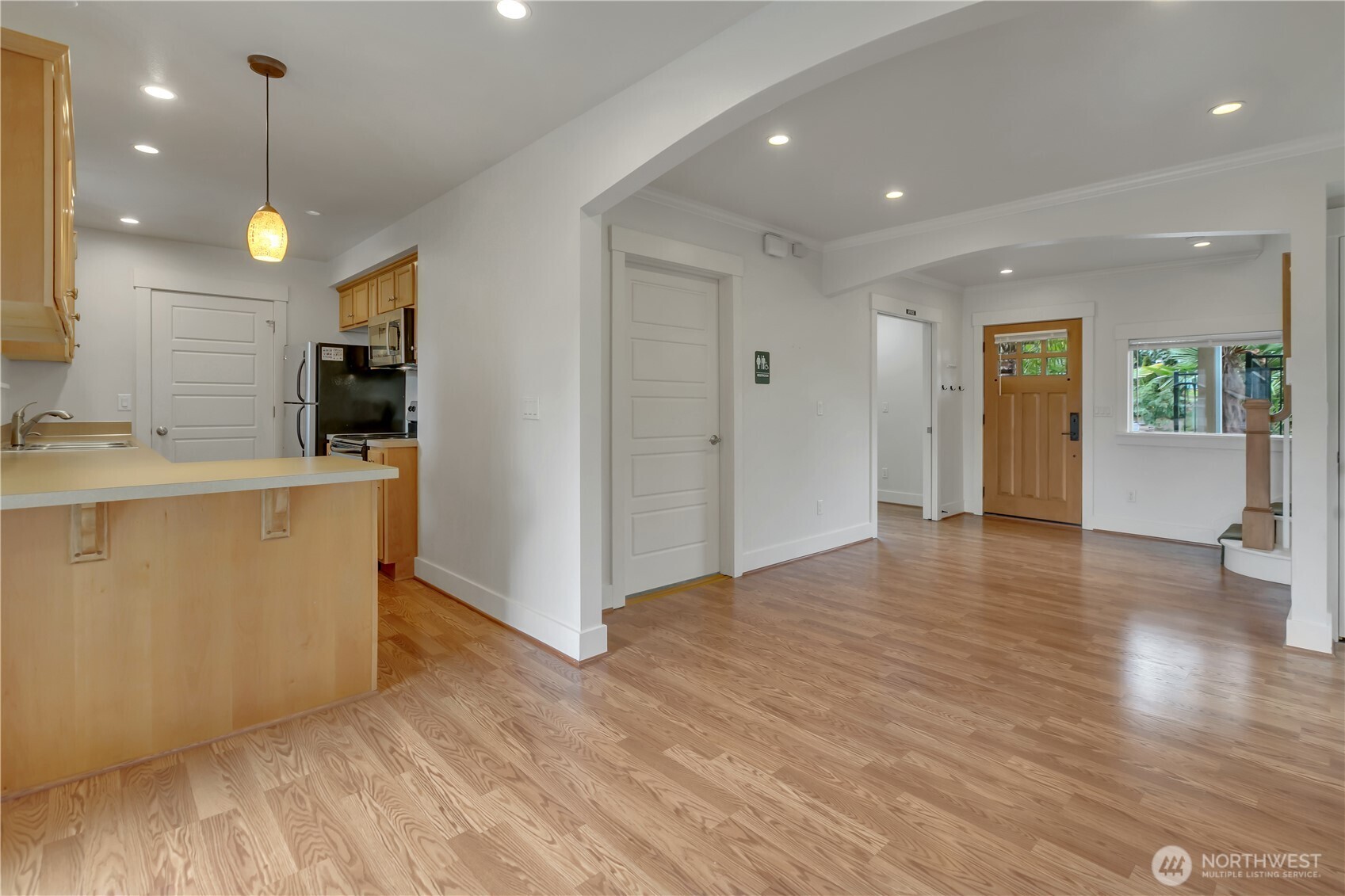 4945 North Pearl Street Ruston, WA 98407 - Photo 7 of 22 a view of a kitchen with a sink and cabinets