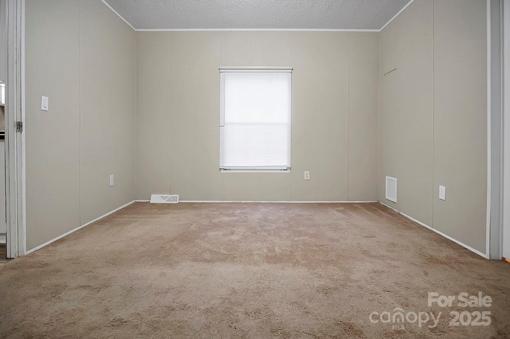 203 Bethlehem Church Road Grover, NC 28073 - Photo 17 of 34 an empty room with a window