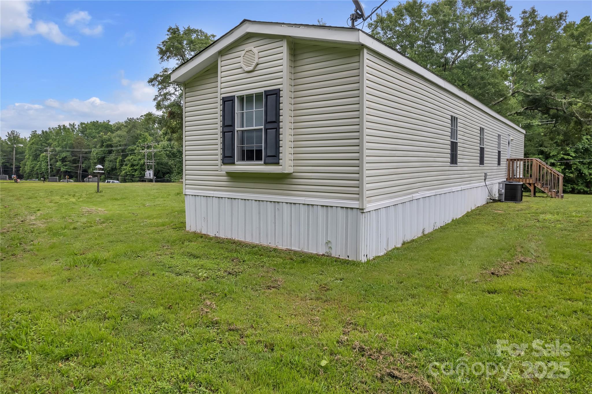 203 Bethlehem Church Road Grover, NC 28073 - Photo 24 of 34 a view of a backyard with a garden