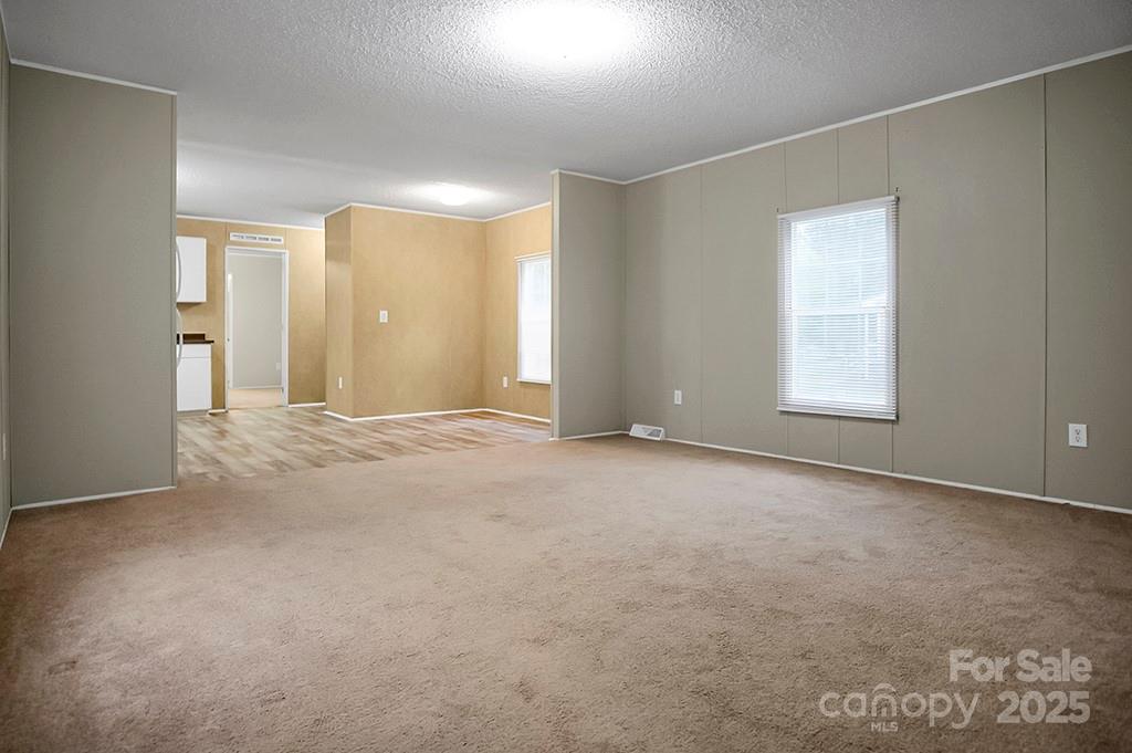 203 Bethlehem Church Road Grover, NC 28073 - Photo 5 of 34 a view of an empty room with a window