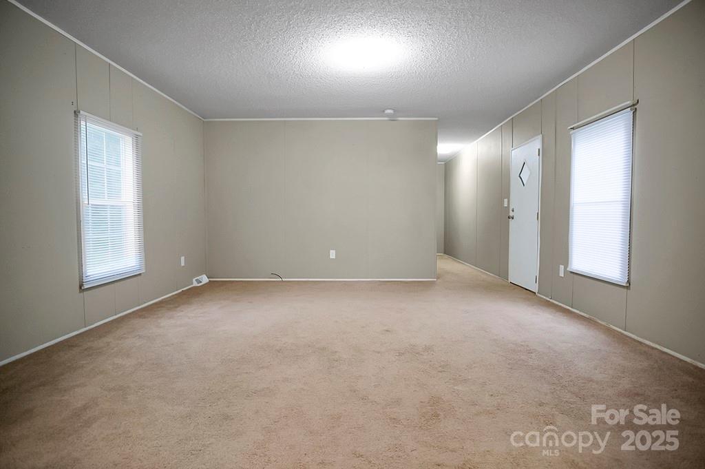 203 Bethlehem Church Road Grover, NC 28073 - Photo 6 of 34 a view of an empty room with a window