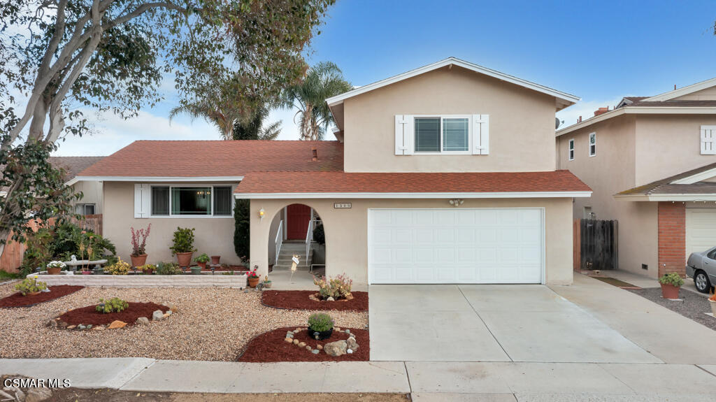 1300 Rachel Drive Oxnard, CA 93030 - Photo 1 of 50 a view of a white house with a outdoor space
