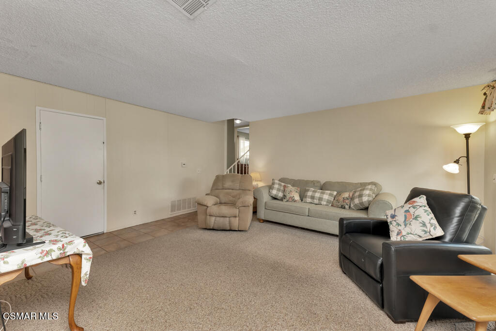 1300 Rachel Drive Oxnard, CA 93030 - Photo 18 of 50 a living room with furniture and a flat screen tv