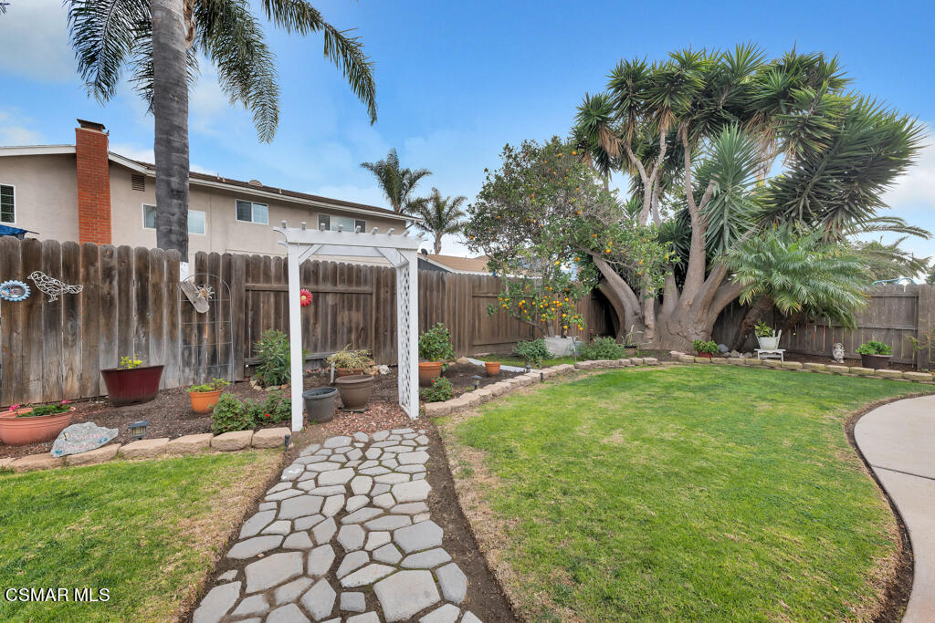 1300 Rachel Drive Oxnard, CA 93030 - Photo 36 of 50 a front view of a house with garden